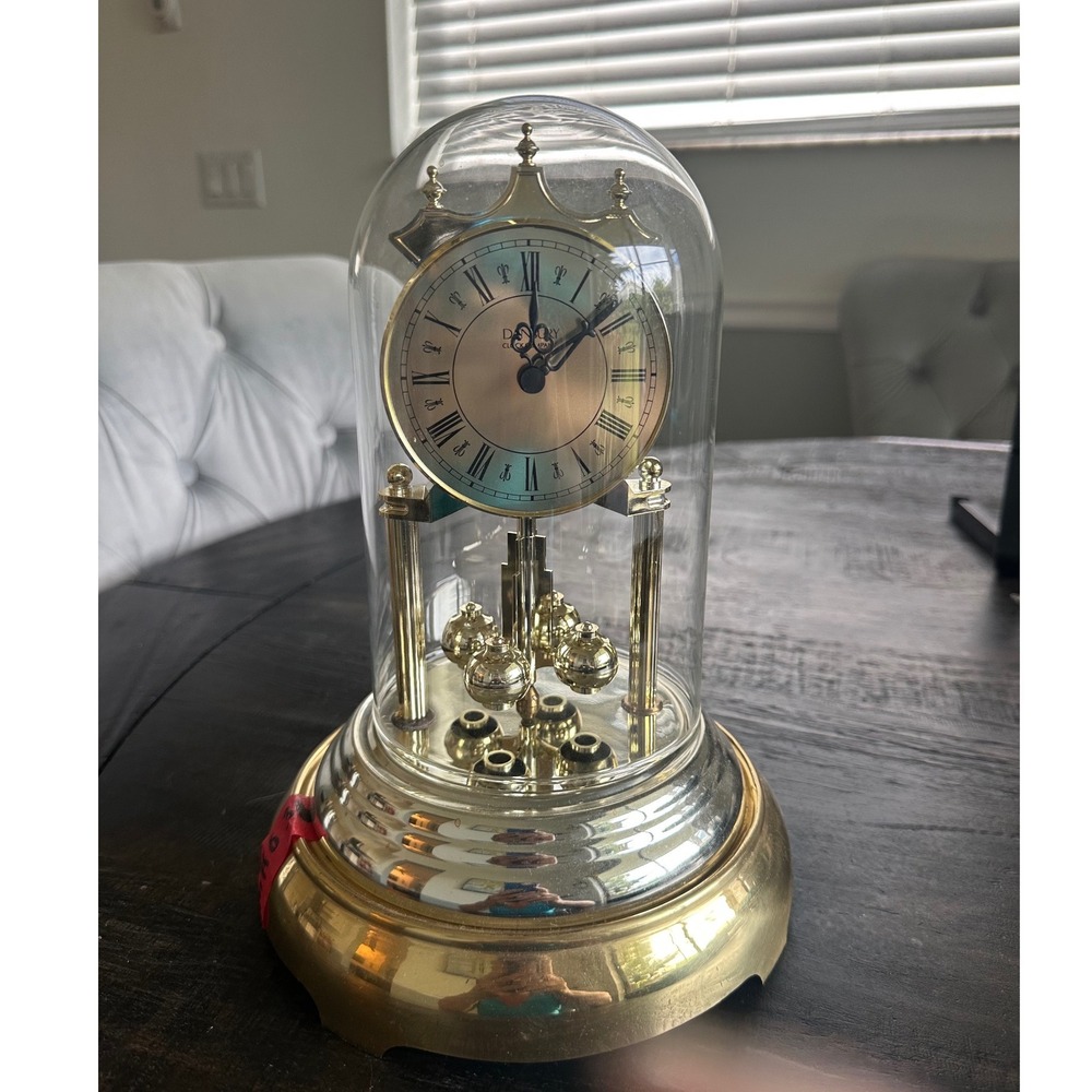 Vintage Danbury Clock Co Anniversary Clock Glass Dome Rotating Pendulum Working